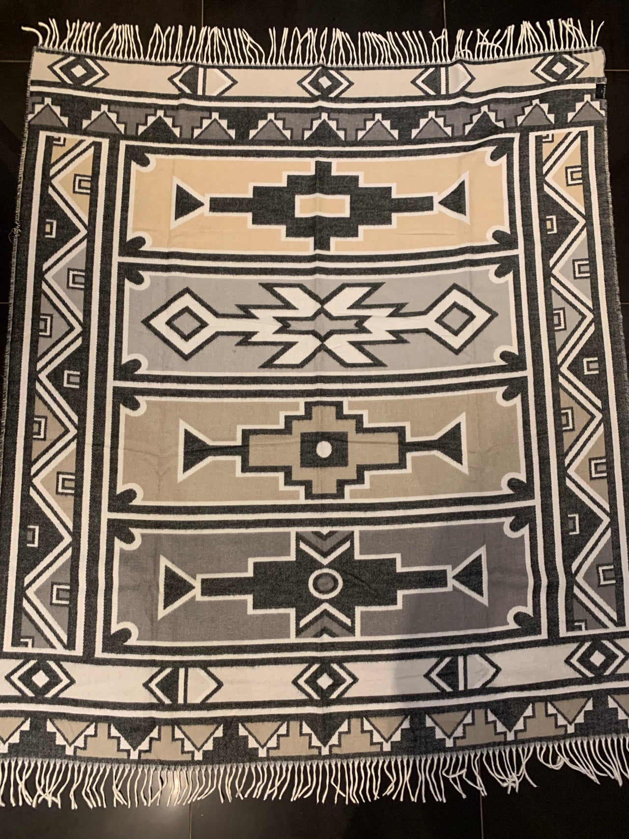 Ndebele throw grey and black geometric pattern